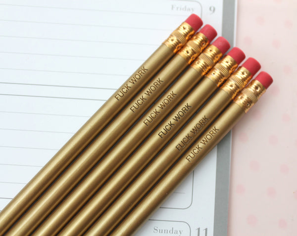 fuck work engraved pencils in gold by the carbon crusader